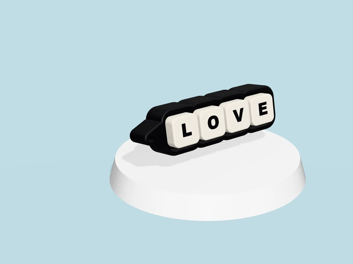 Letter Keys reading LOVE on black clicky keyboard keys